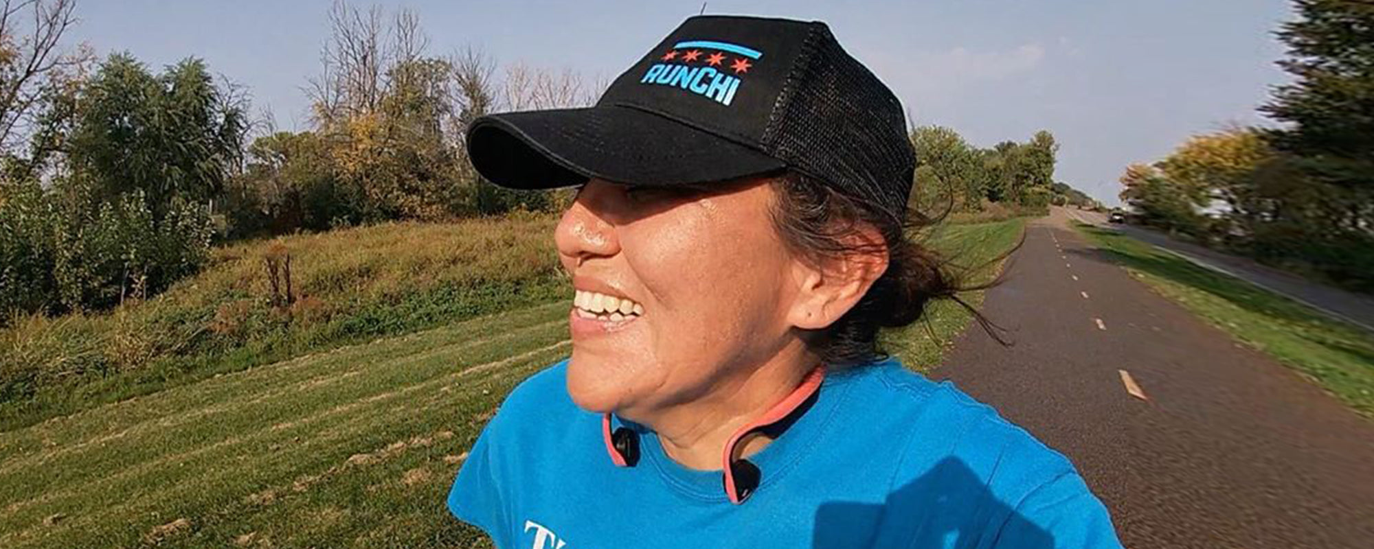 Navajo runner Verna wears AfterShokz headphones while running