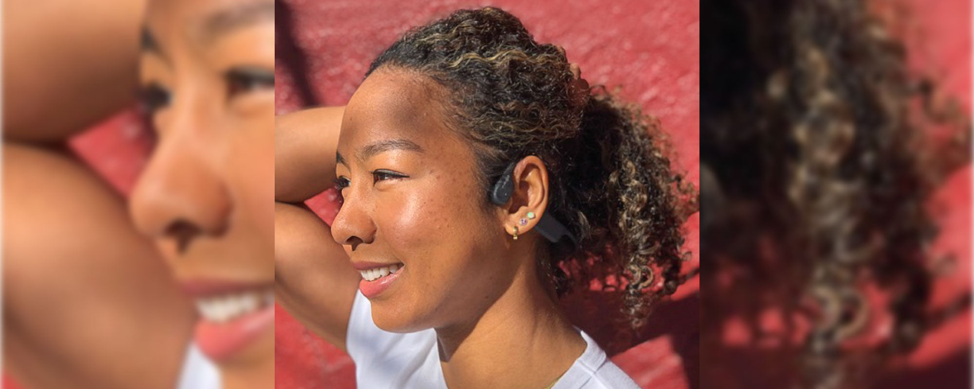Olympic swimmer Lia Neal wearing AfterShokz Xtrainerz swimming headphones