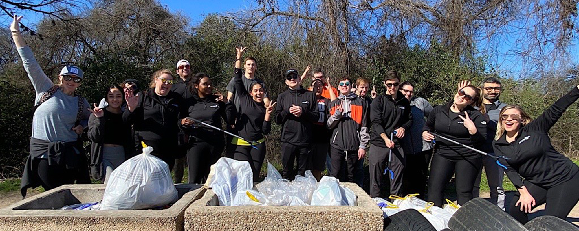 Team Shokz pictured together during a trash pick up in 2020