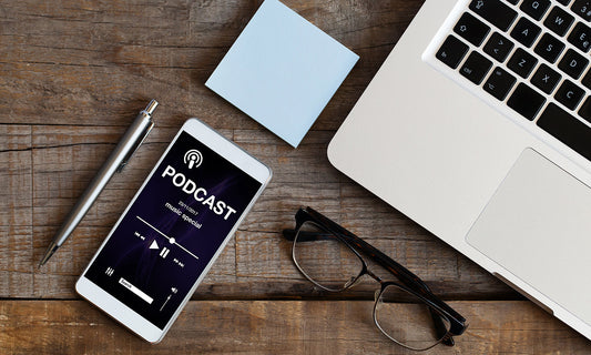 What We're Listening To: Podcast Edition