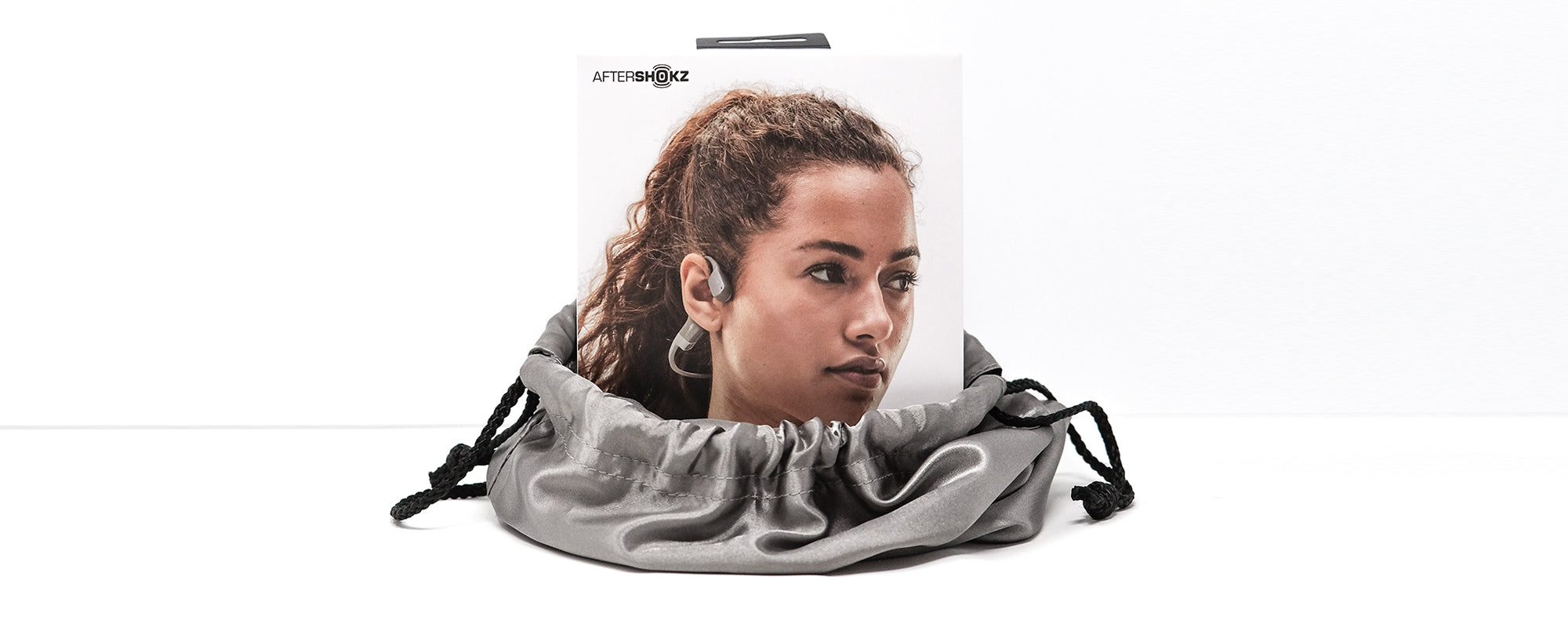 AfterShokz headphones package inside of an AfterShokz gift bag 
