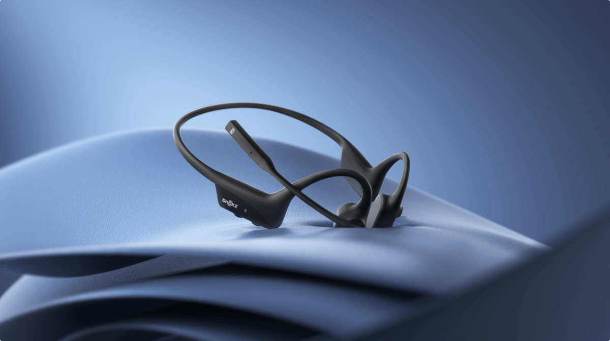 Advanced
Open-Ear Design
Unlike traditional headsets that cover your ears and cut you off from your surroundings, OpenComm2's open-ear design keeps you connected to the world without compromising on comfort or audio quality.
Lightweight and Easy
The OpenComm2 is remarkably light and portable, weighting only 35g.
Effortless Comfort
With a flexible wraparound frame and soft silicone finish, the OpenComm2 delivers easy, effortless, all-day wear.